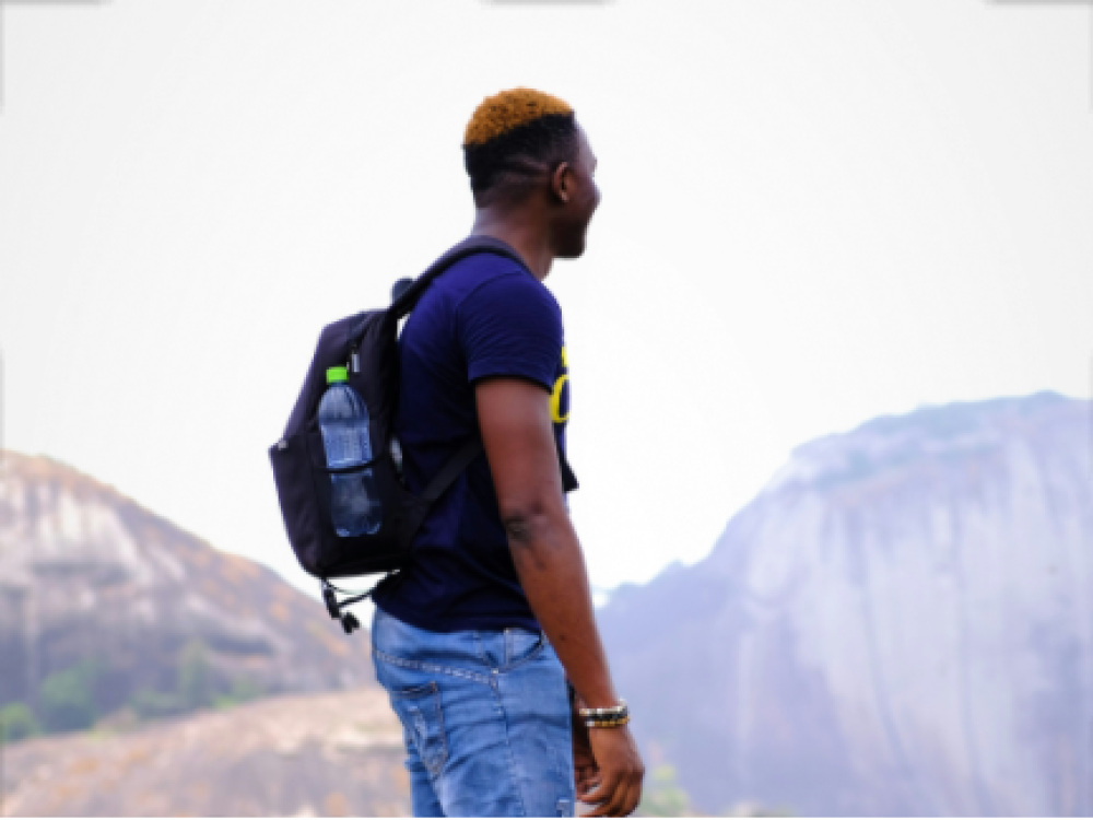 Young man of character sizing up challenge