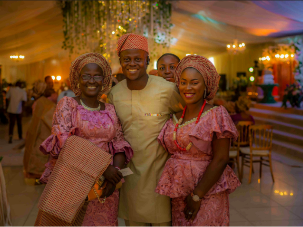 Family embracing money and spiritual values